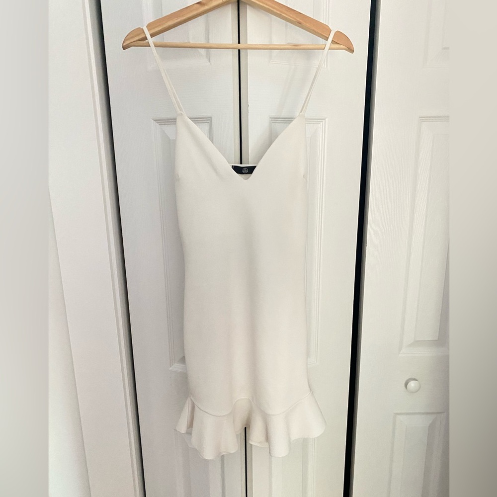 White body-con dress with bottom flare